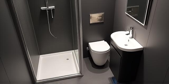 Urban minimalist bathroom with a corner shower unit, wall-mounted toilet, and integrated lighting.